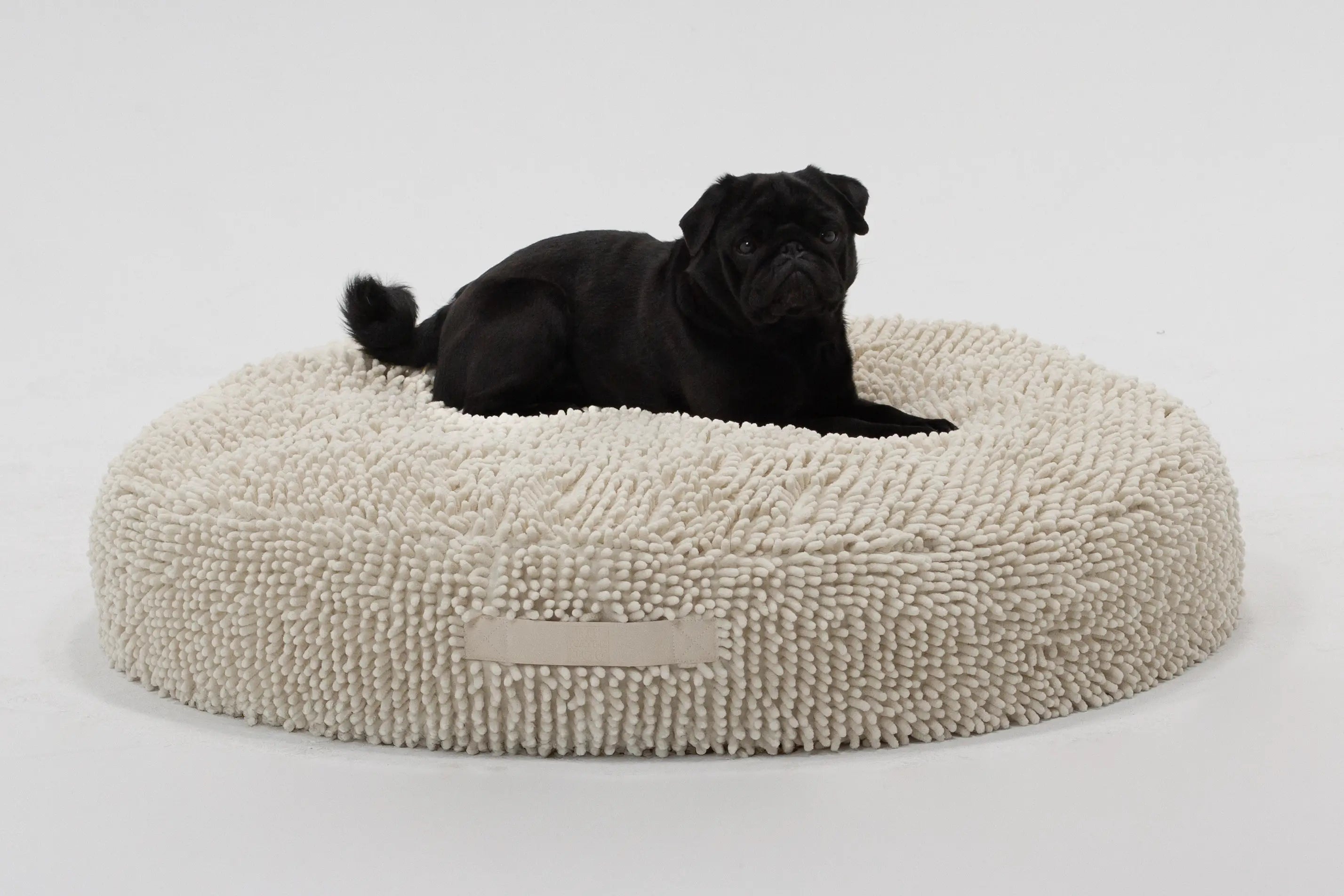 Medium Snoozy Bed - Calming Orthopedic Donut Dog Bed (Cream Towel)